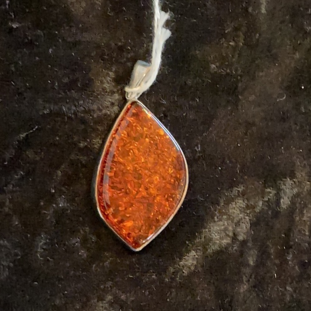 Silver and Amber large pendant 2 inches by one and a quarter inch